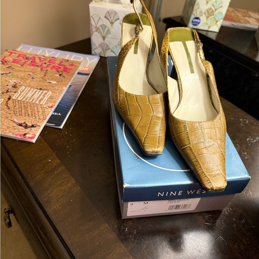 Nine West green Croc pump.